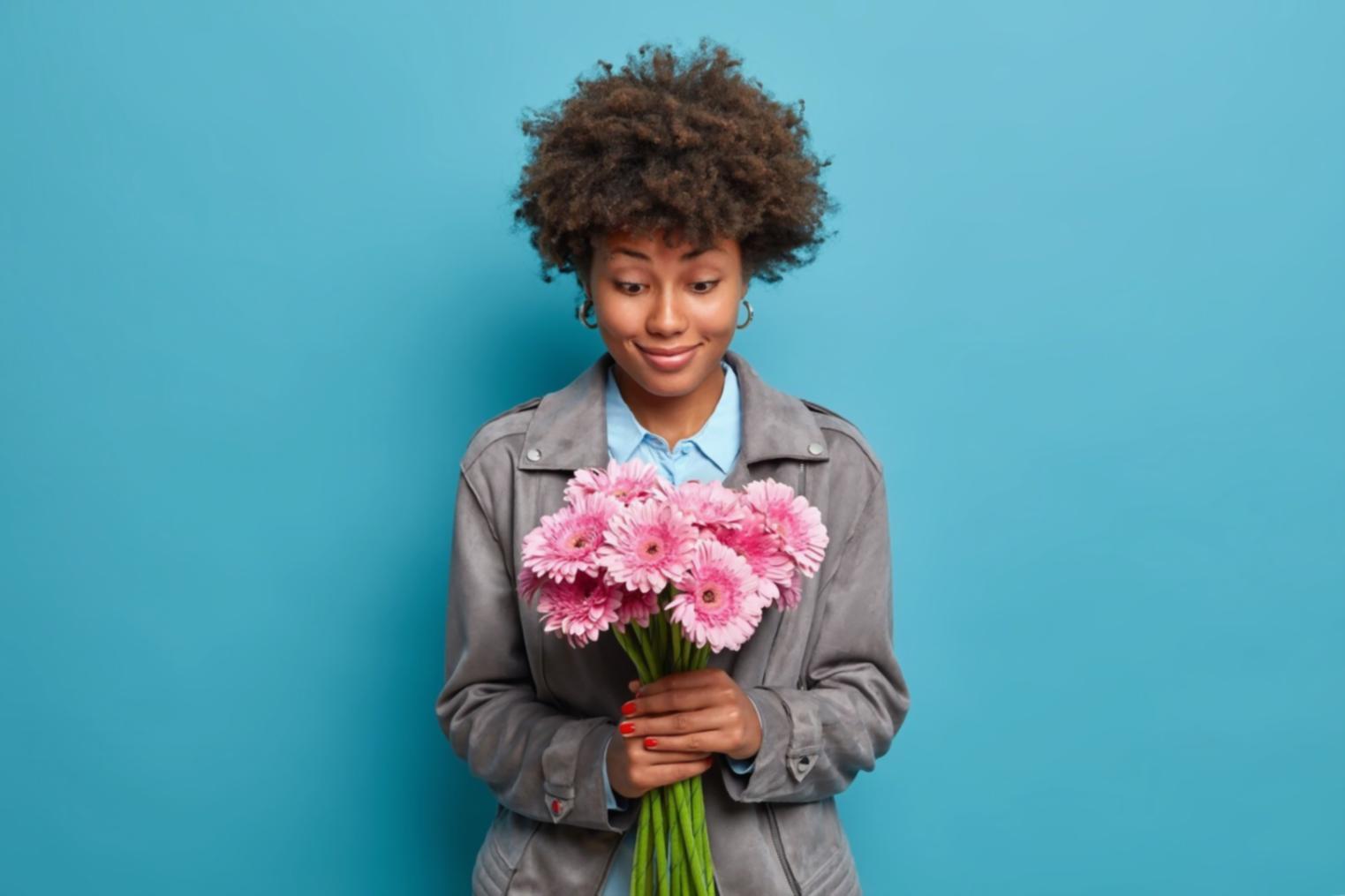 Specialist preparing a custom arrangement